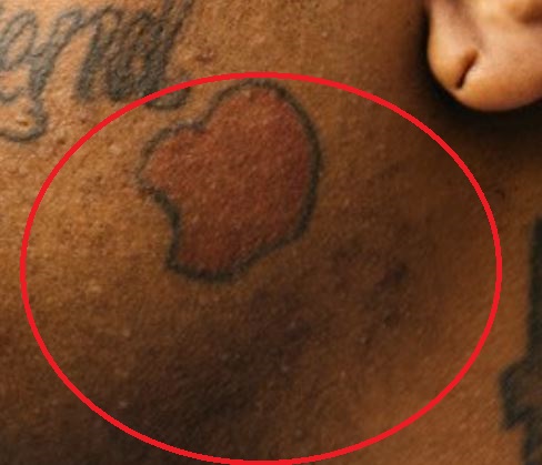 Greedo skruosto tatuiruotė