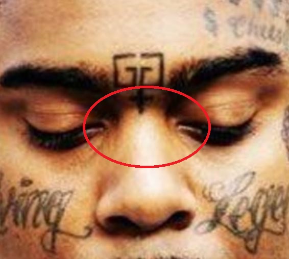 Greedo kryžiaus tatuiruotė