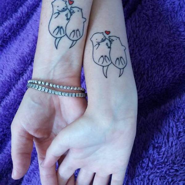 Tatuagens de mãe e filha