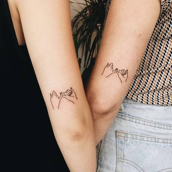 Tatuagens de mãe e filha