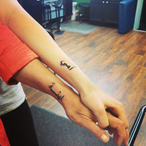 Tatuagens de mãe e filha