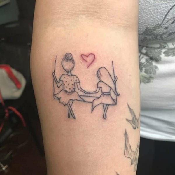 Tatuagens de mãe e filha