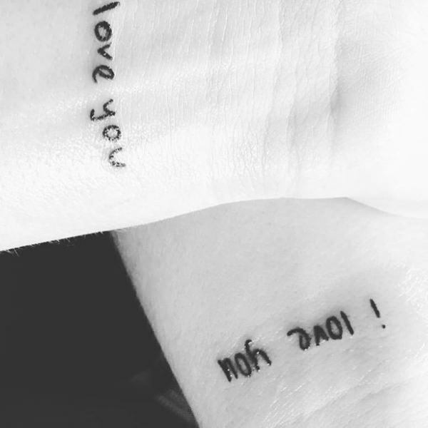 Tatuagens de mãe e filha