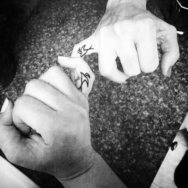 Tatuagens de mãe e filha