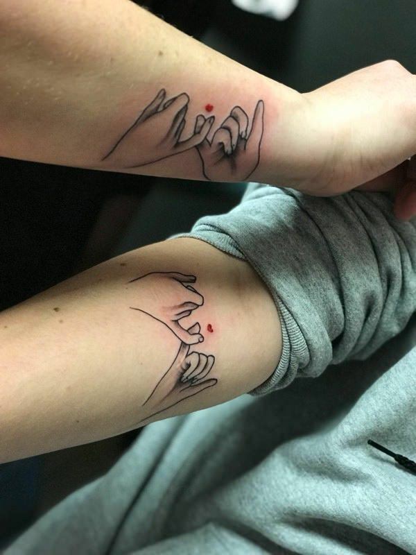 Tatuagens de mãe e filha