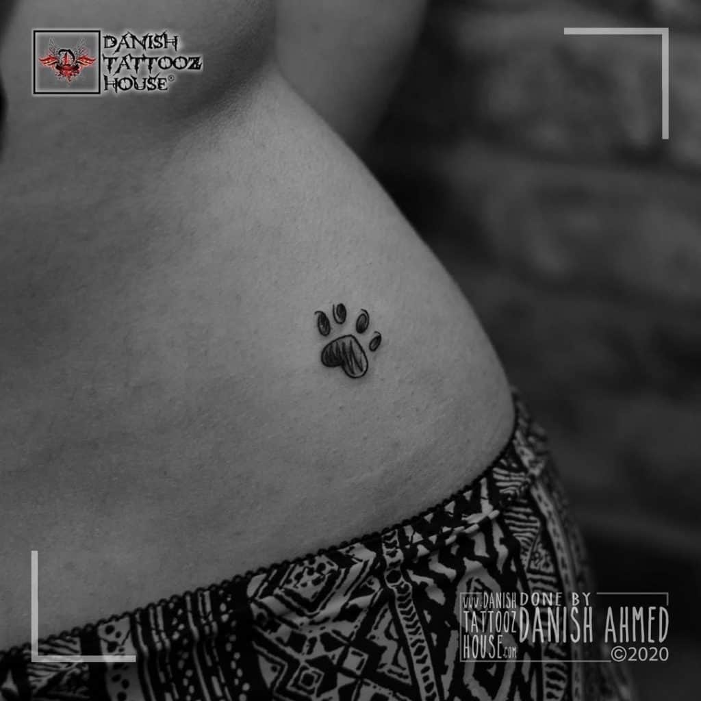 Tiny Dog Paw Tattoo