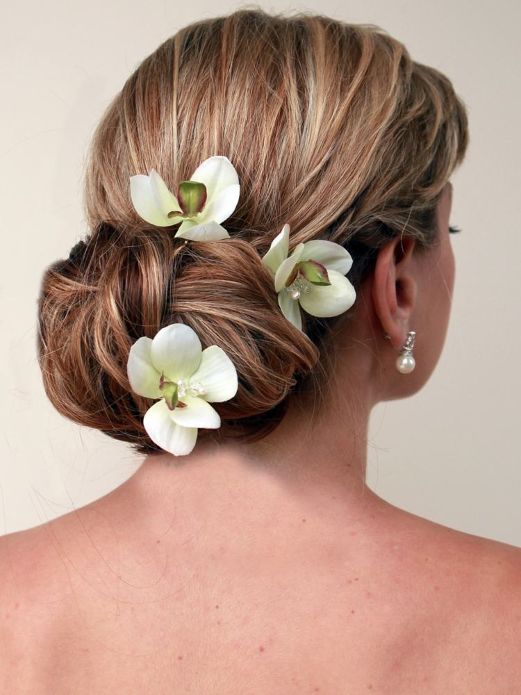 coafuri de mireasa elegante cu orhidee coc alb floare verde