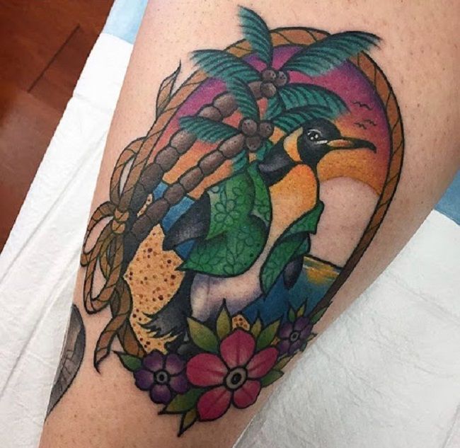ビーチをテーマにしたペンギンのタトゥー