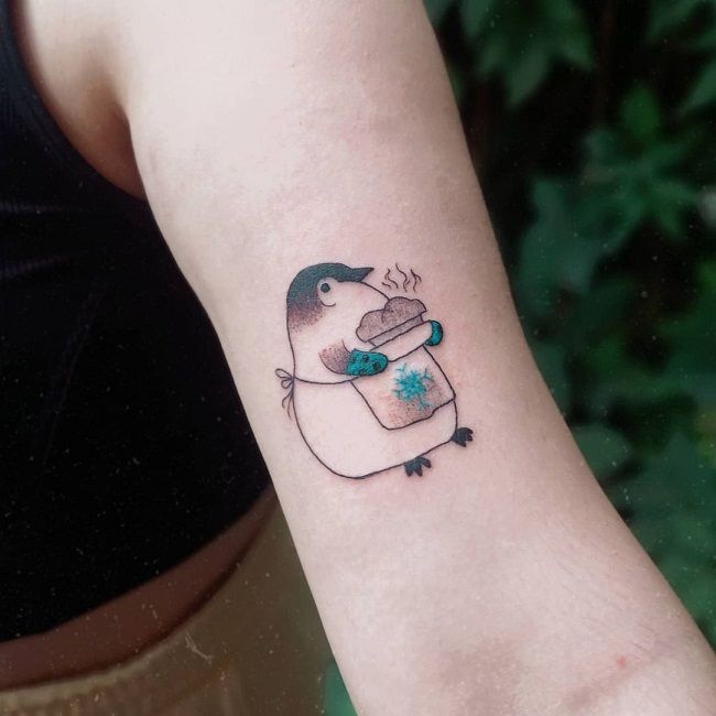 「シェフペンギン」のタトゥー