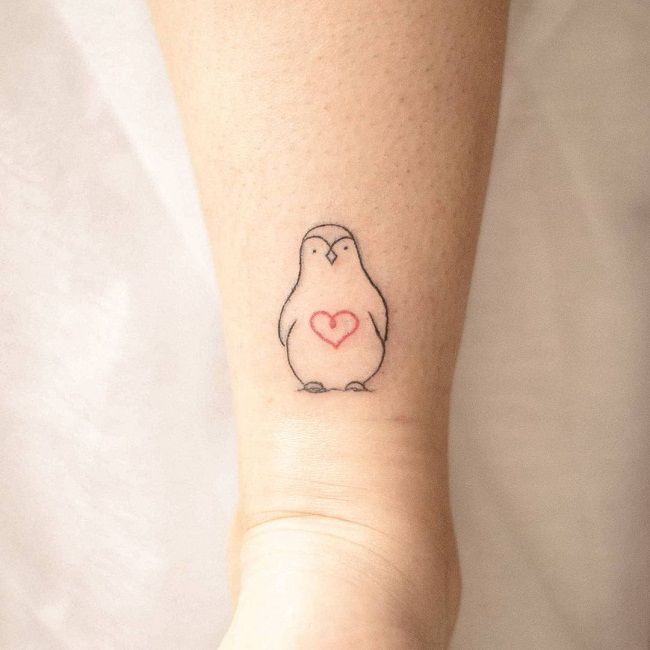 「ハートのペンギン」タトゥー