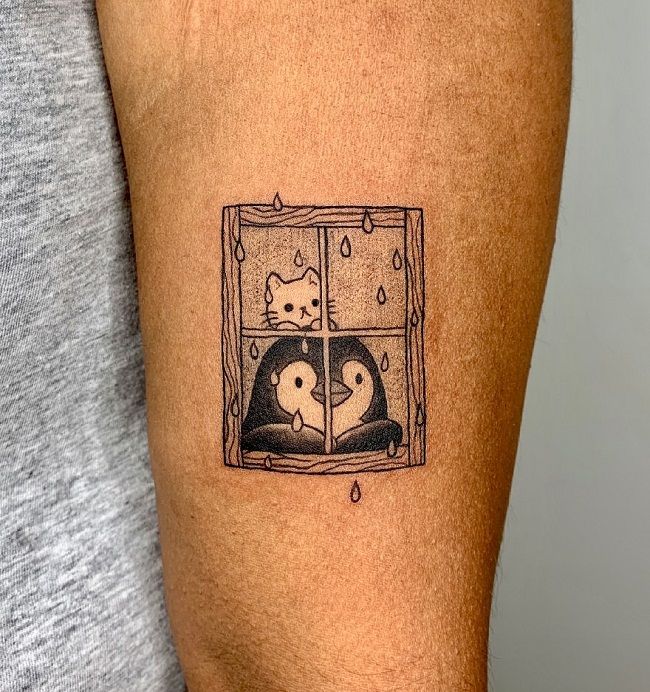 「キティとペンギン」のタトゥー