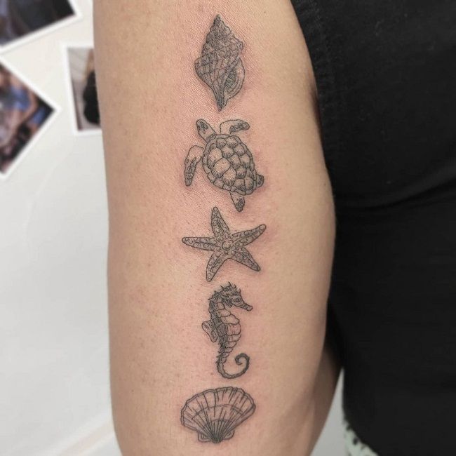 「他の海の生き物とタツノオトシゴ」のタトゥー