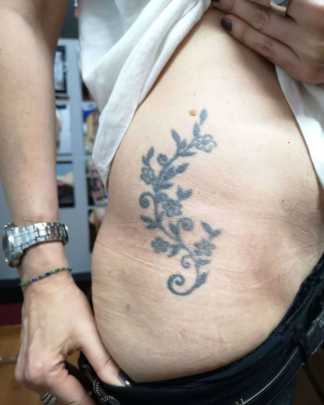 Gėlių tatuiruotės dangtelis