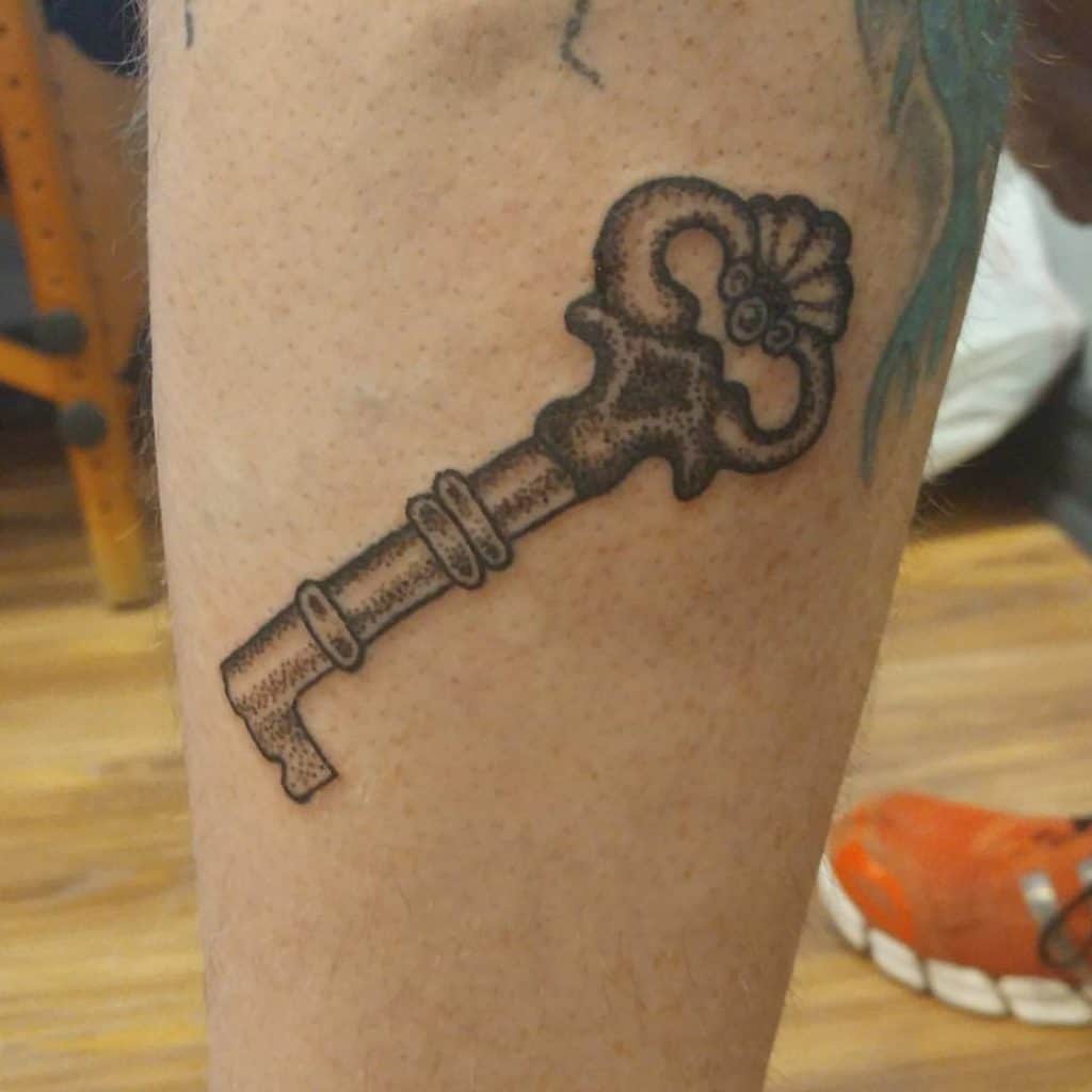 Tatouage clé squelette 1