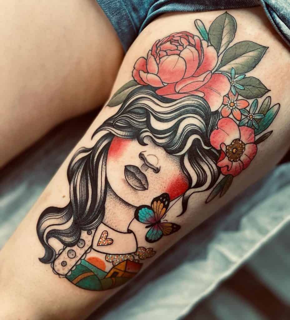 Donne del tatuaggio della coscia