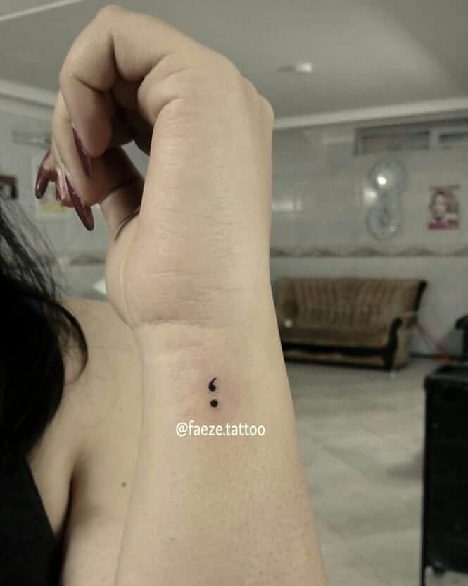 Le tatouage des virgules inversées 3