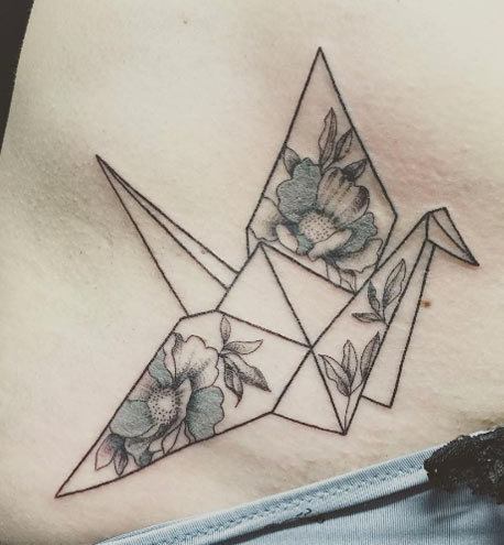 Ragazza tatuata origami