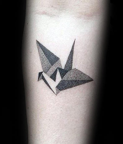 Tatuaggio origami gru a portata di mano