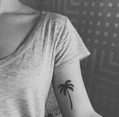 Palmės tatuiruotė ant rankos