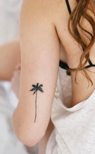 Palmės tatuiruotė ant rankos