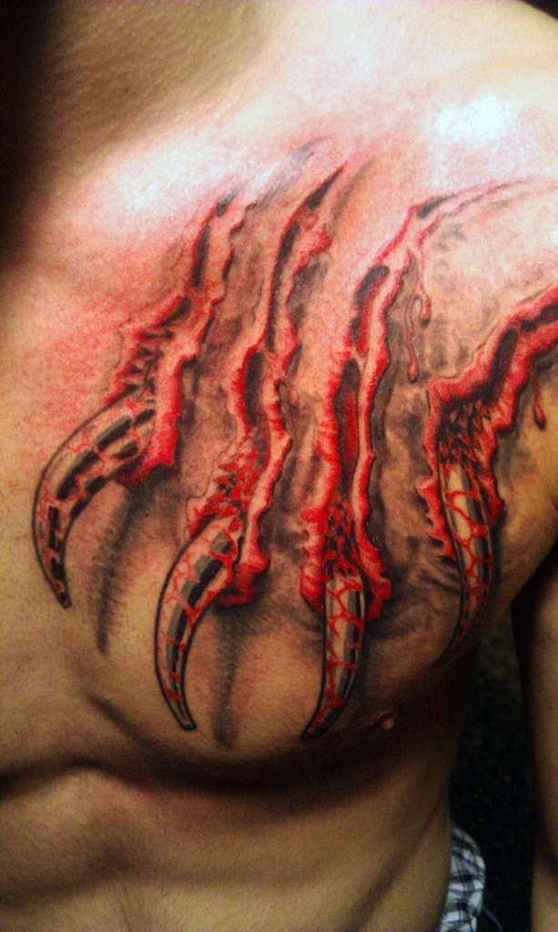 Tatuagem de sangue no peito para homens