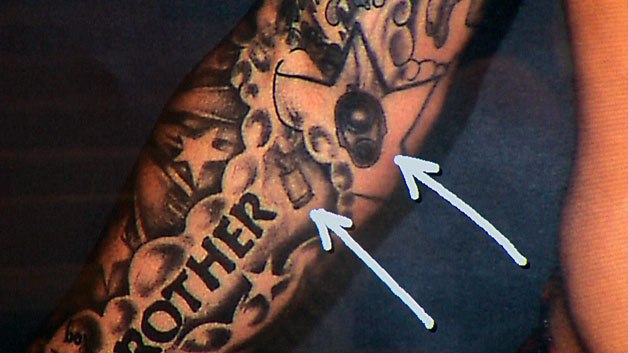 Tatouage de douille et de museau d'arme à feu