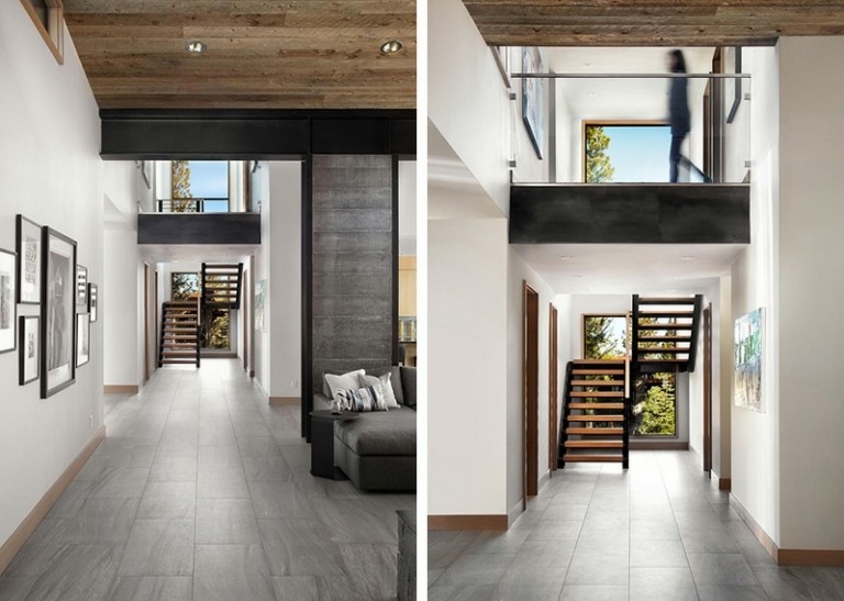 Printre altele, în zona scărilor se află un perete de beton perete accent piatră hol hol zonă scări interior modern design perete alb