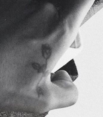 Tetovaža Amine Rose