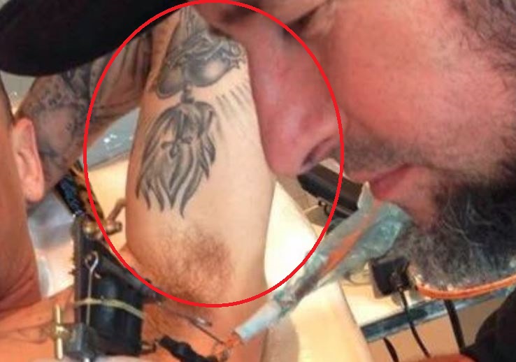 Tatuagem de andres bíceps