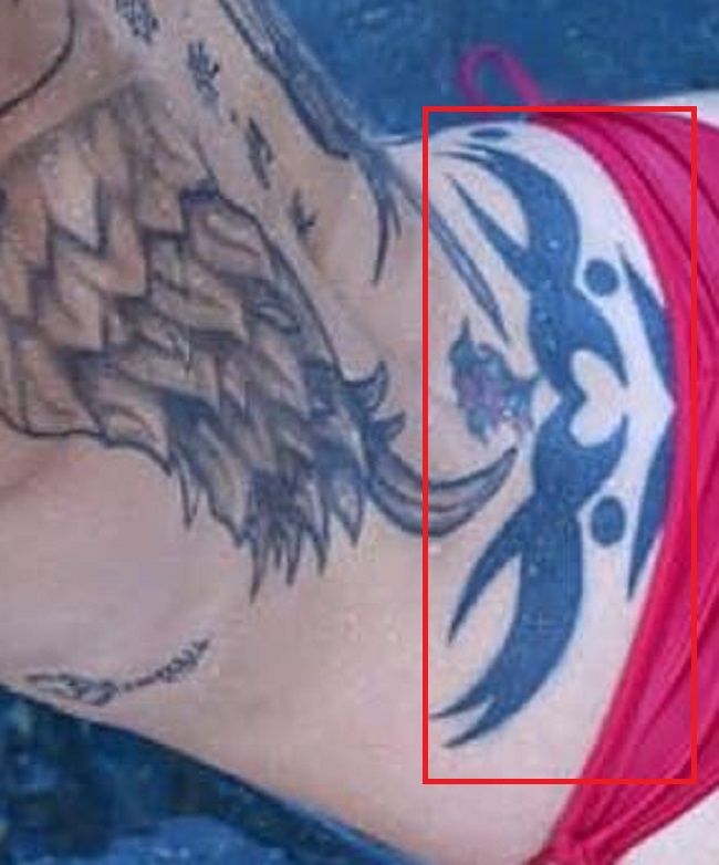 Anna Bell-Peaks-spodnji del hrbta-tetovaža