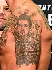 Anthonny Pettitis kairės rankos portreto tatuiruotė