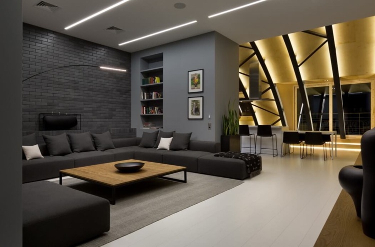 Setați iluminare indirectă atractivă în camera de zi Culoare antracit -moderna-mansarda-apartament-living-pffen-bucatarie-canapea-caramizi