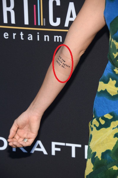 tatuagem de briana evigan braço direito