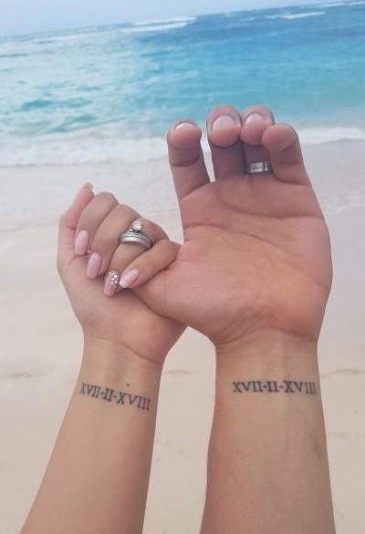 Tatuaggio Numero Romano per coppia