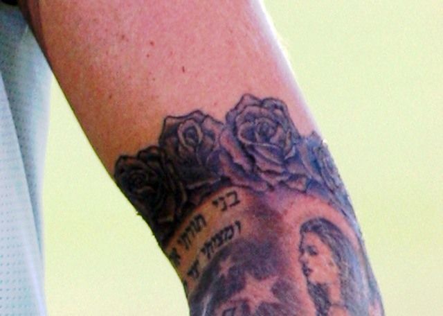 David Beckham tatouage 10 roses