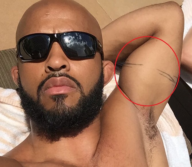 Demetrious Johnsonas Kairė ranka Tattoo.jpg