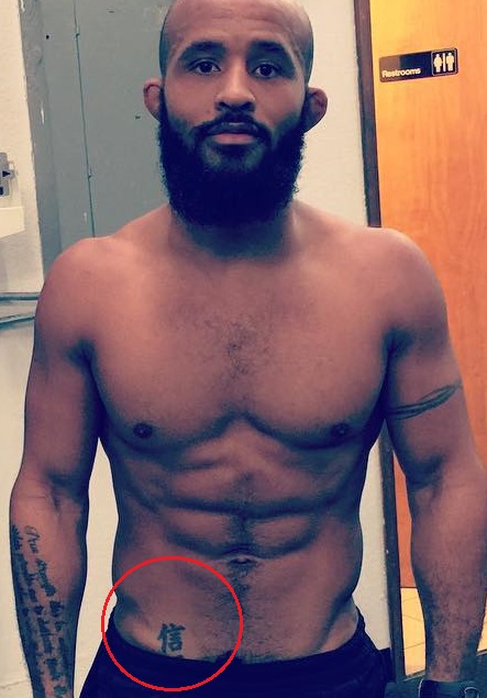 Demetrious Johnson skrandžio tatuiruotė