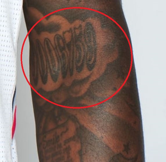Numero di DeShawn sul tatuaggio del braccio