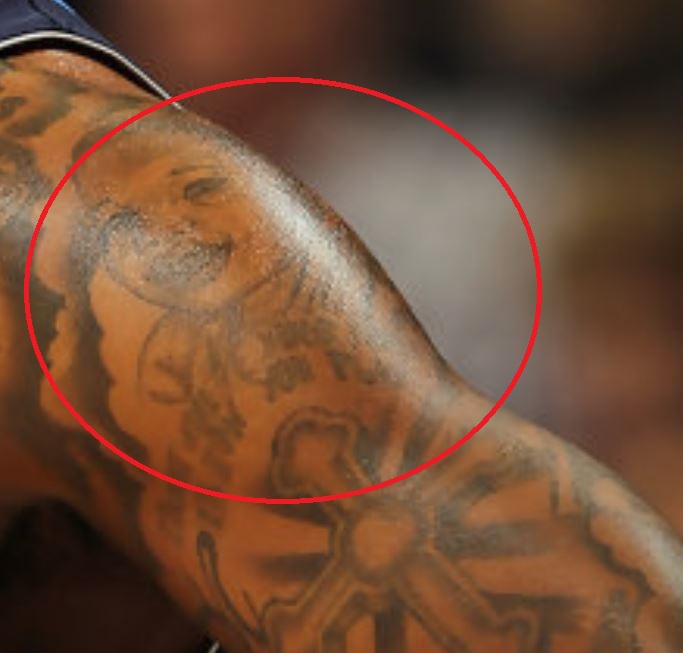 Ritratto di DeShawn sulla spalla tatuaggio