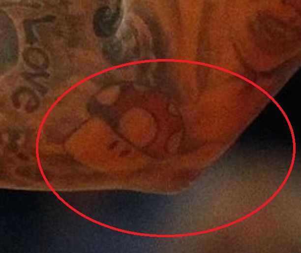 Tatuaggio di fungo rosso DeShawn