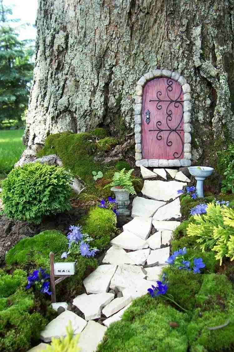Decorul grădinii include, de asemenea, plante frumoase pentru curtea din față face-it-yourself-gradina-decorare-usa-gradina-cale-gresie-bucati-muschi-plantare-gradina din fata