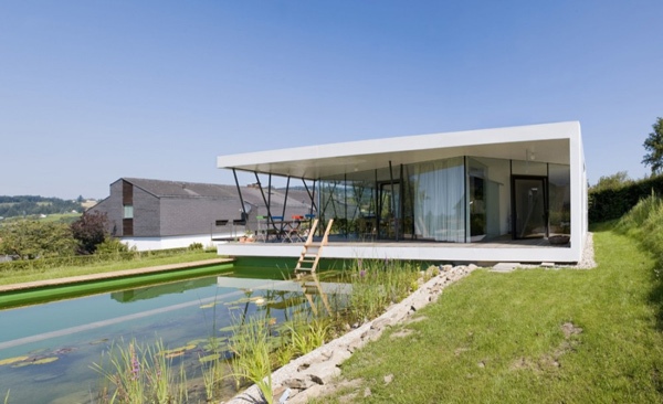 fațadă de sticlă inovatoare de design cu o singură poveste arhitectură minimalistă modernă - se întinde pe grădină