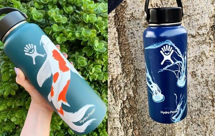 Sticlele de băut pictează pe metal un motiv de pește koi