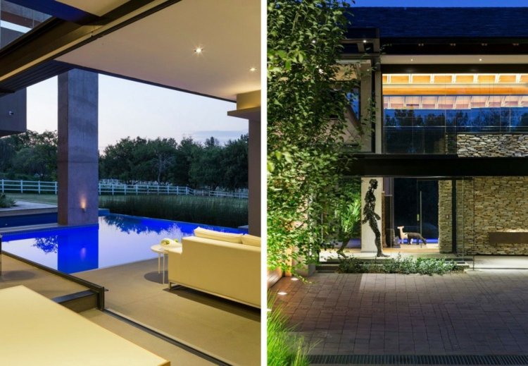 Zona de intrare cu aspect natural și lounge-ul de lângă piscină, cu mobilier alb casa structura rezidentiala materiale naturale intrare perete sticla piatra fatada plante