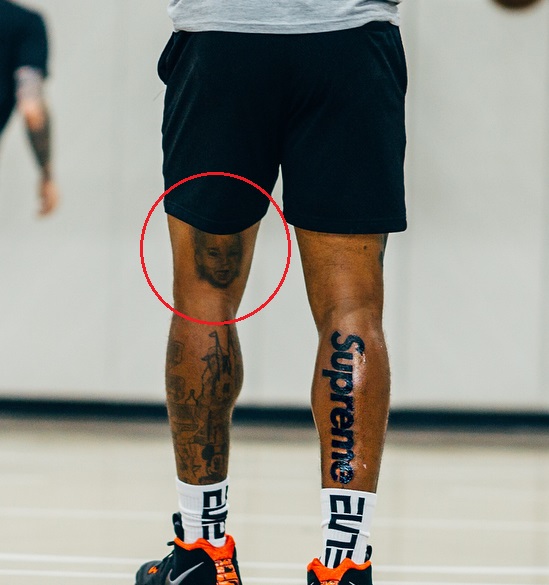 Tatouage de fille de jambe gauche de J.R Smith