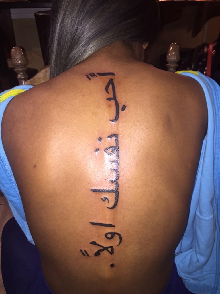 Jayda tatuaggio sulla schiena