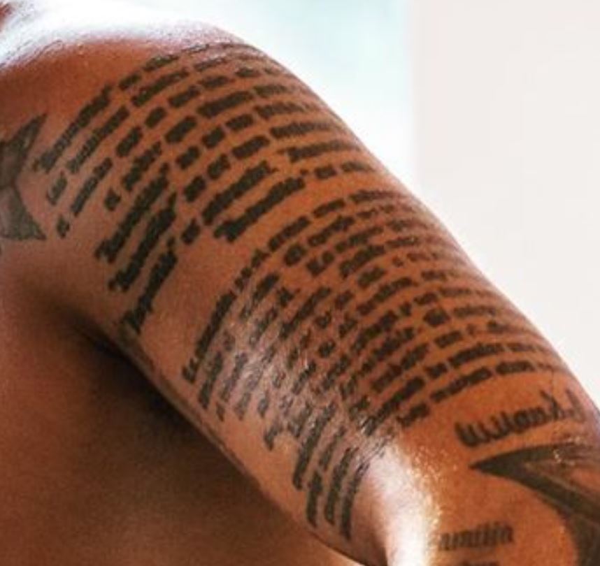 Josef natpis na lijevom bicepsu