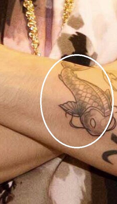 justin-bieber-koi-poisson-bras-tatouage