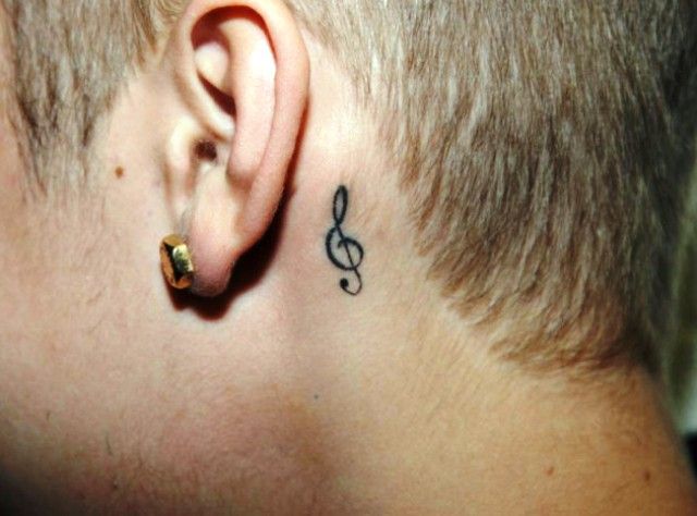 Justin Bieber tatouage clé de sol