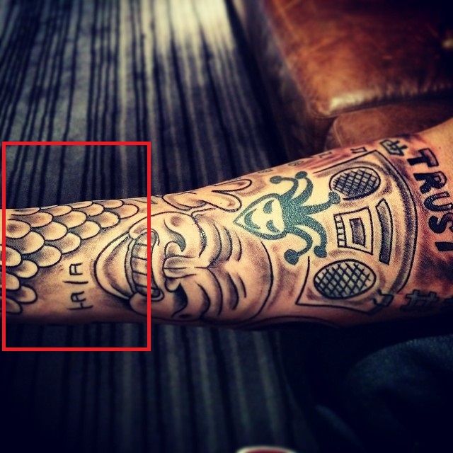 Justin tatouage